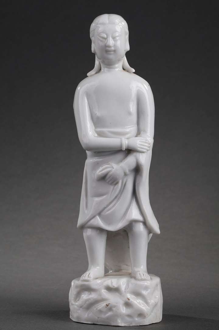 Standing figure of a man traditionally called Adam in Blanc de Chine porcelain